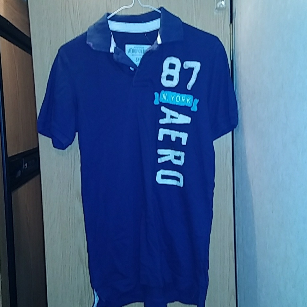 Aero button up collered shirt with emblem.